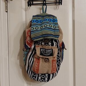 One-of-a-kind Rice Love travel backpack upcycled boho hippie style